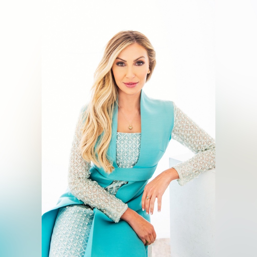 Vintage blue beaded sleeve gown with Elsa vibes